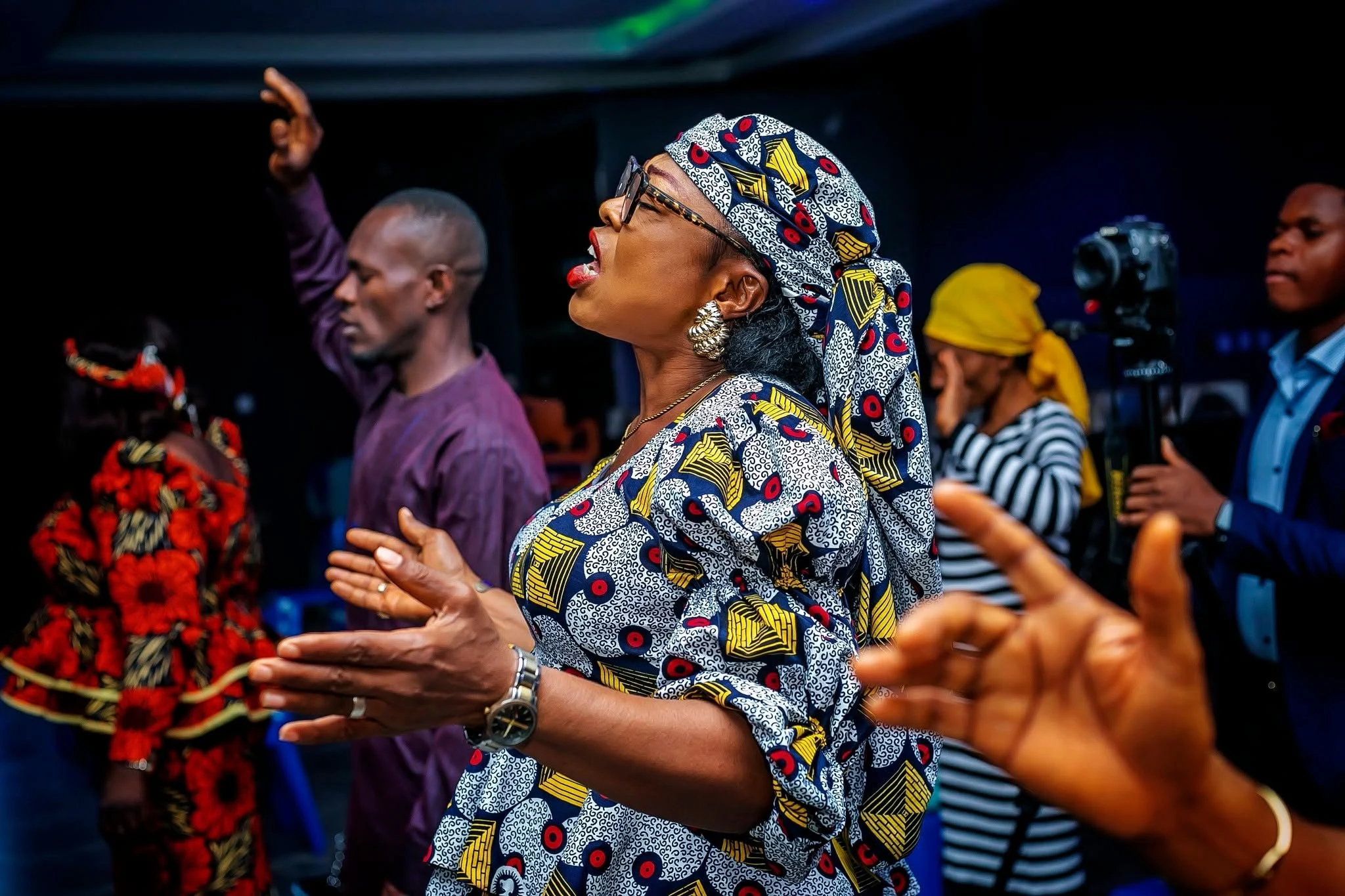 A worship leader singing
