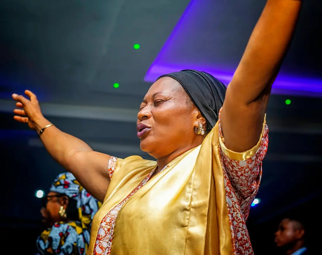 A worshipper with hands lifted